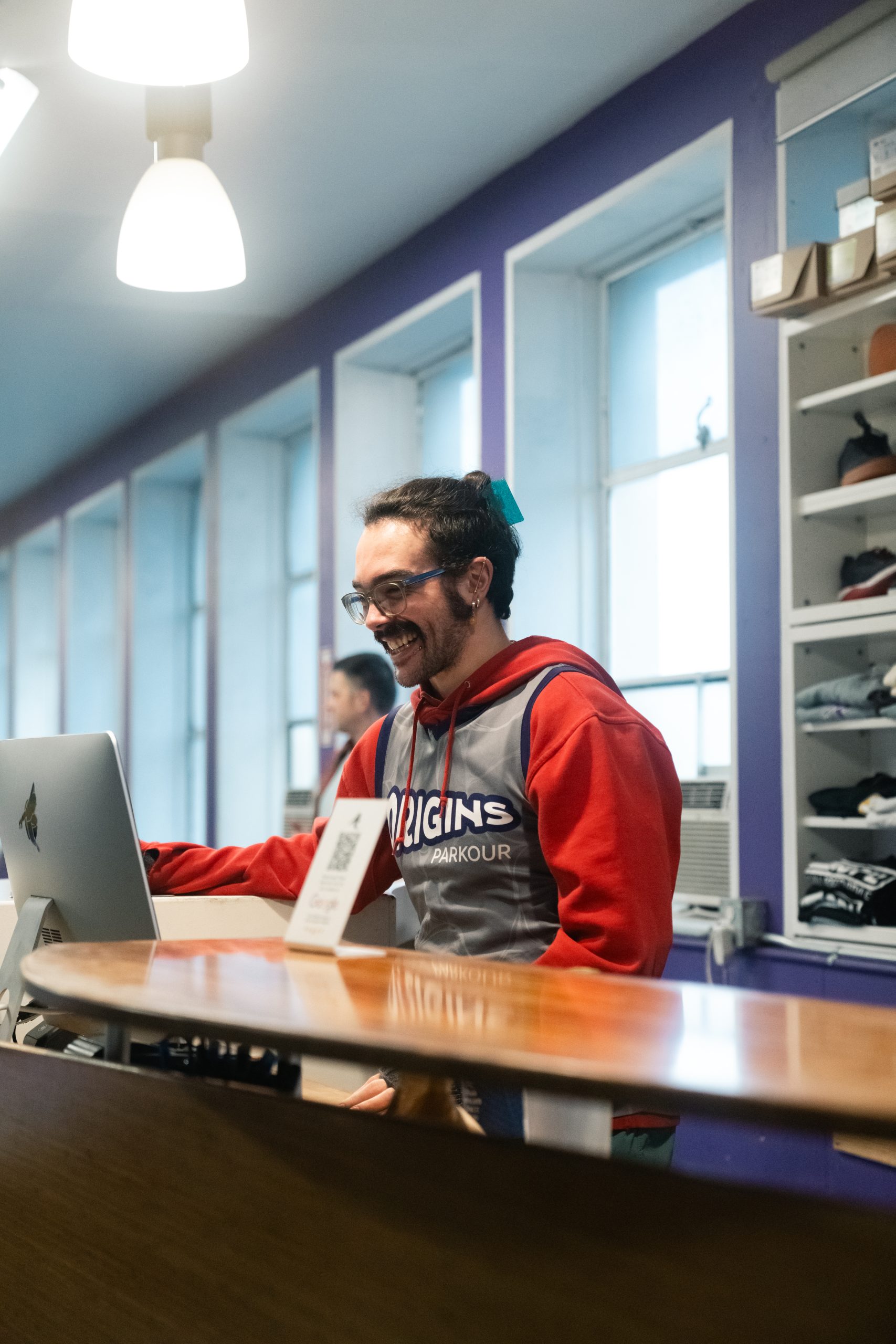 Origins Parkour staff at the front desk